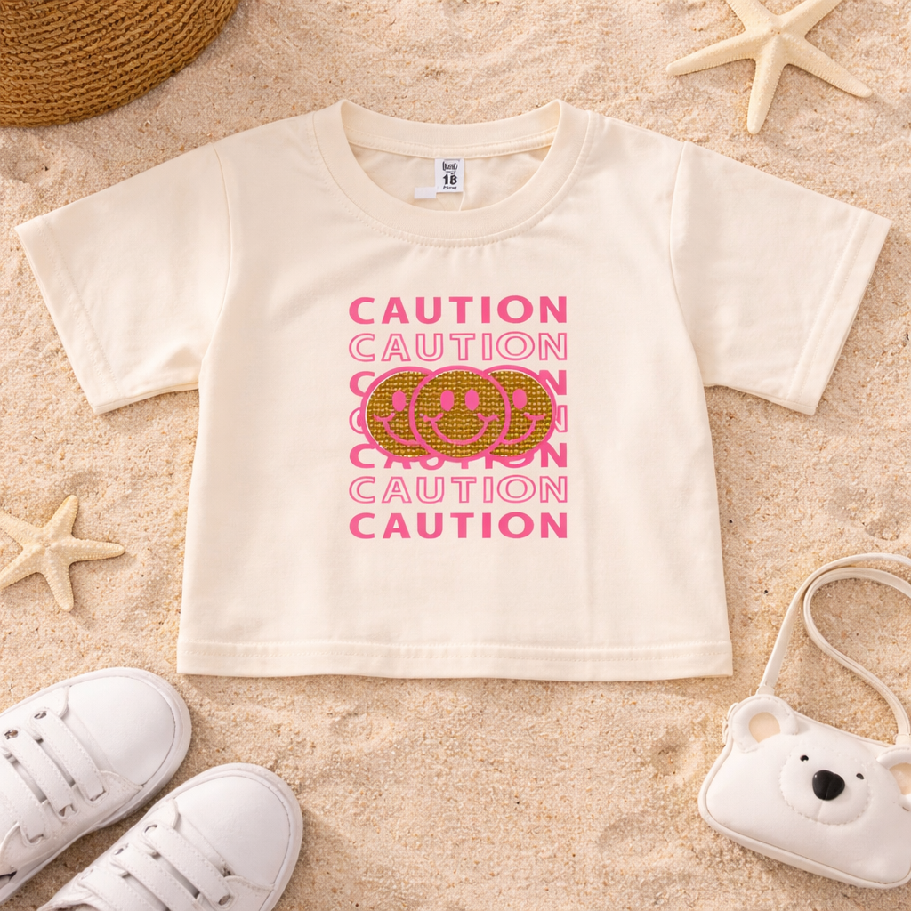 Smile Baby Kids “CAUTION Smiley” Graphic T-Shirt – Cream & Orange | 18 Months to 6 Years