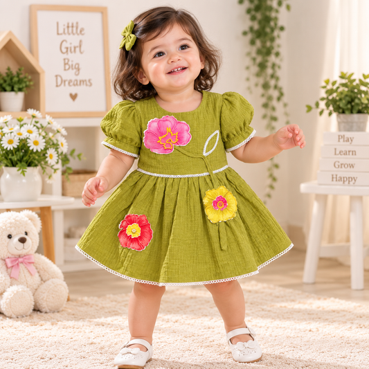 JUST TOTS girls green frock front view with floral appliqué, puff sleeves and white lace trim
