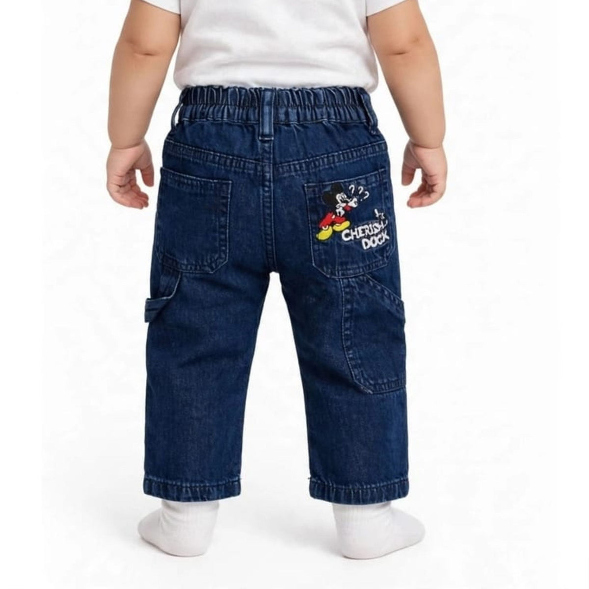 ROXY boys dark blue denim jeans back view with cartoon graphic on back pocket