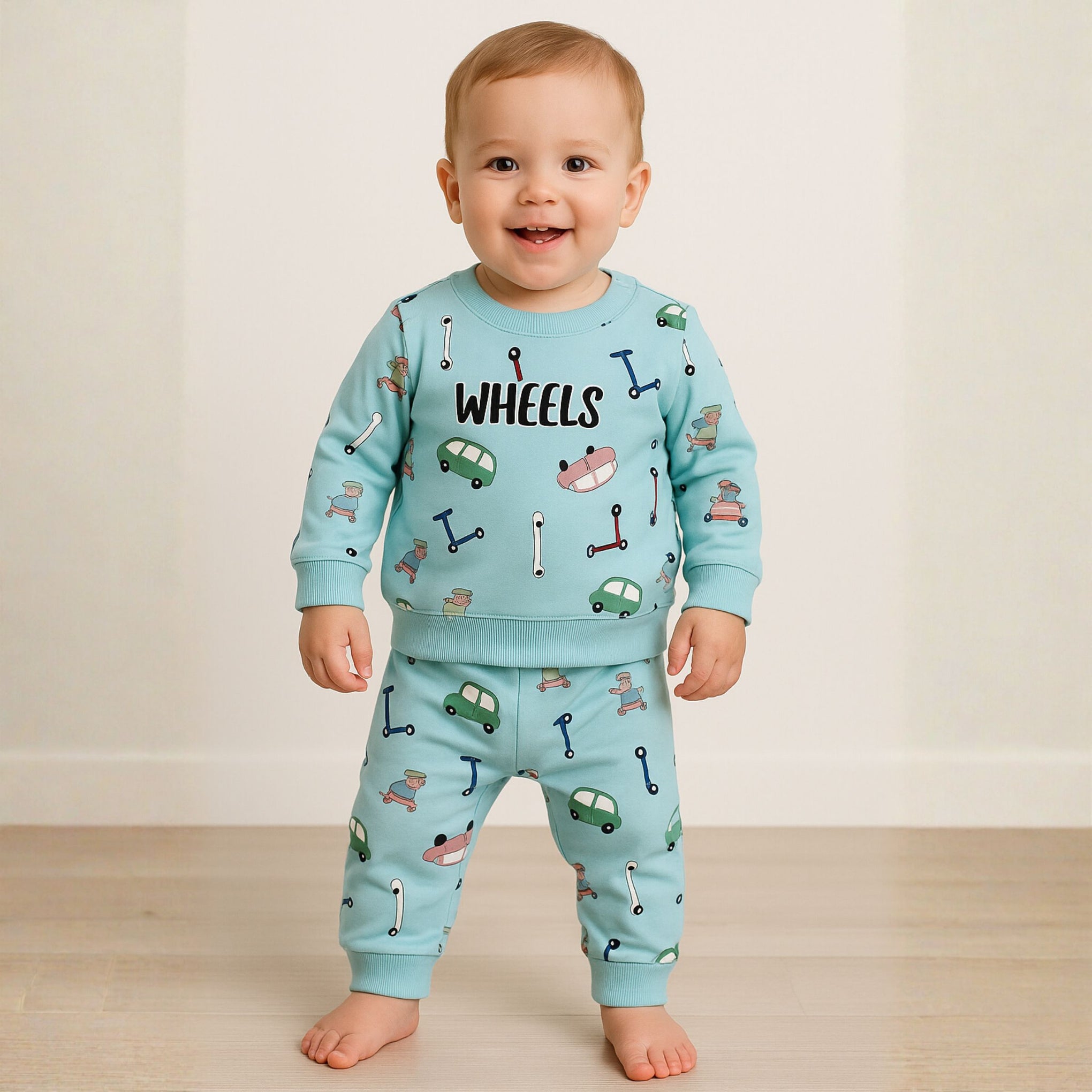 Ollypop “WHEELS” Cotton Sweatshirt & Jogger Set for Baby Boys (3M–3Y) | Fun Car & Scooter Print | Available in Pink Tint, Blue & Cream