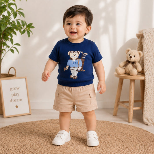 Toffy House baby boy wearing bear print T-shirt and casual shorts front view