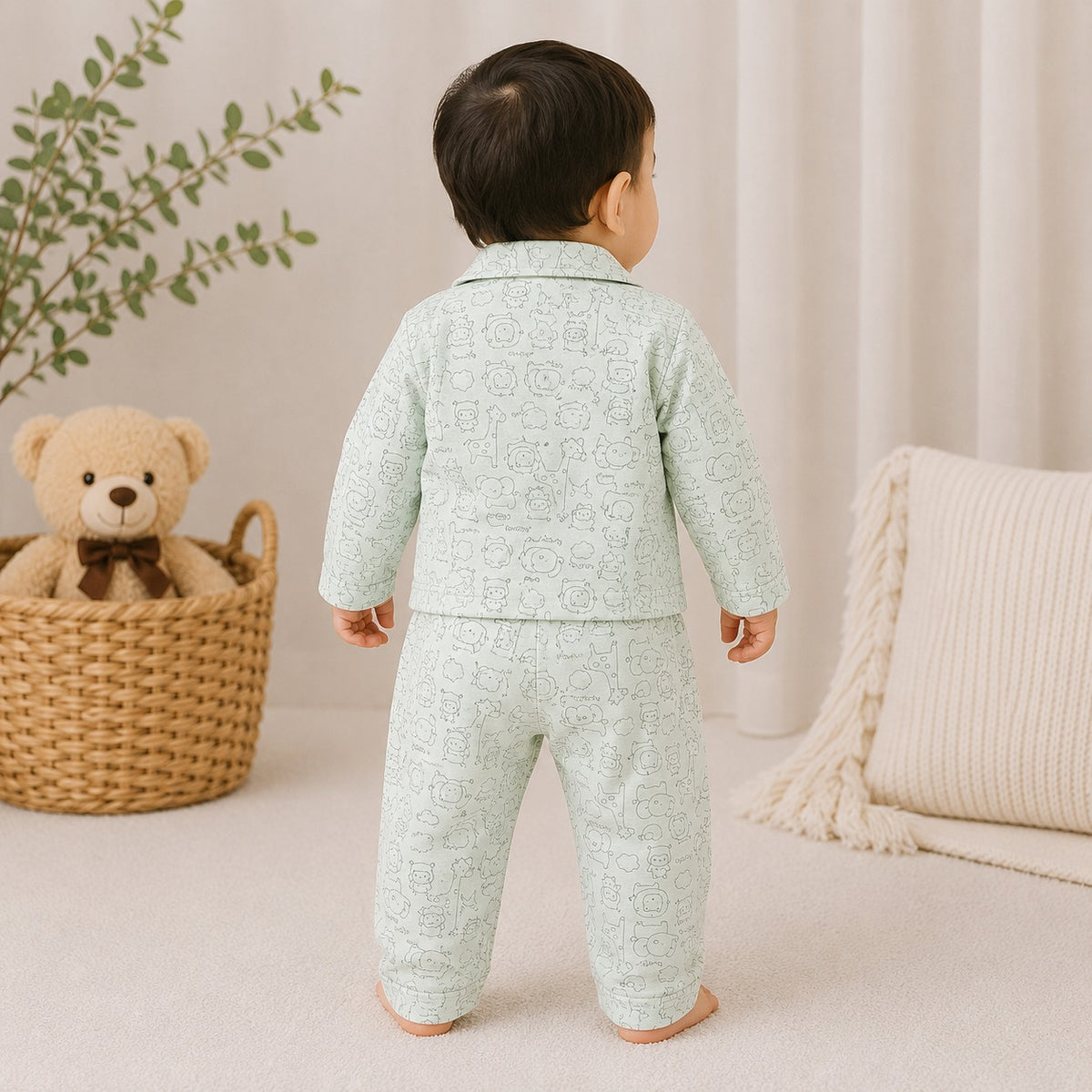 NUM NUM boys green printed pajama set back view with all-over animal doodle pattern and full-length pants