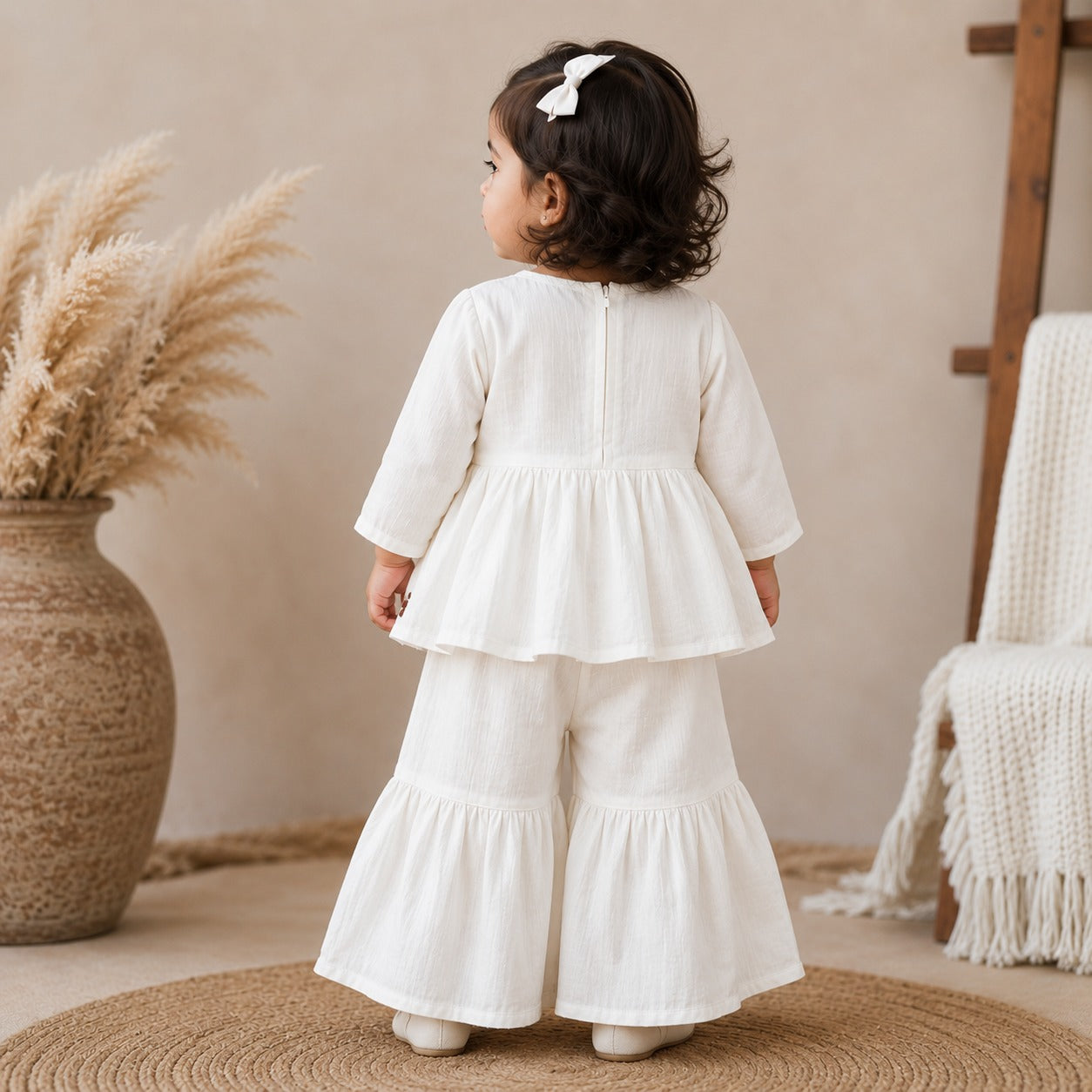 REVERSE X-TREME girls off white embroidered kurta palazzo set back view with concealed zipper and flared palazzo pants