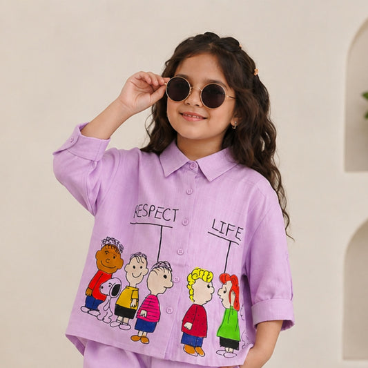Girl wearing Reverse X-Treme purple cartoon character print shirt top with 3/4 sleeves