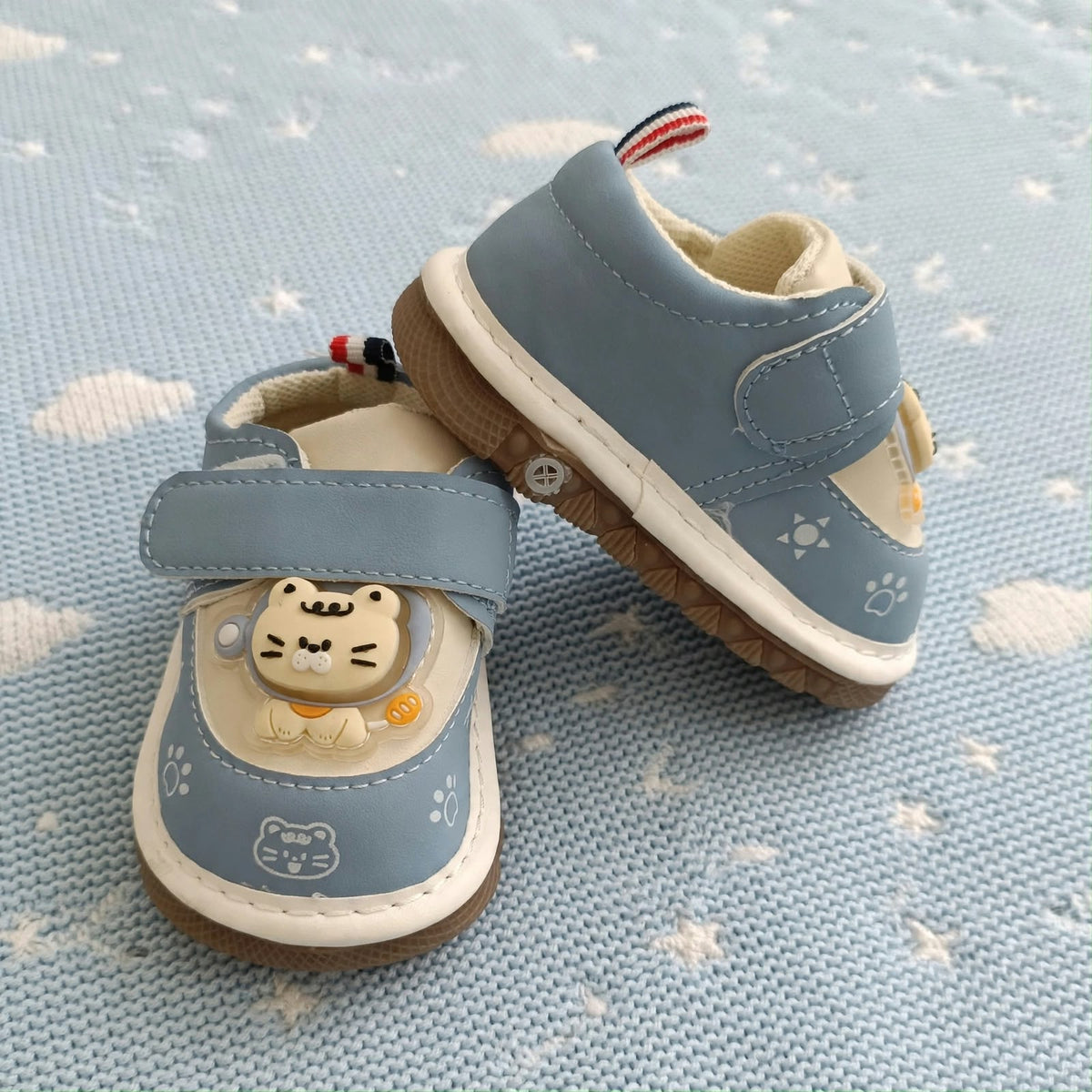 Smile Baby baby blue cat squeaker shoes with adjustable Velcro strap and soft breathable lining