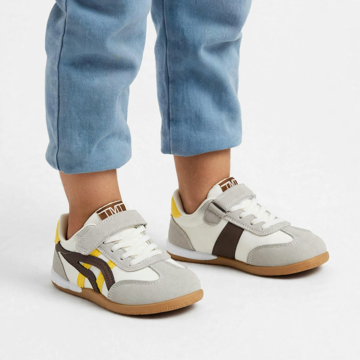 SMILE BABY boys brown white yellow sneakers worn on child