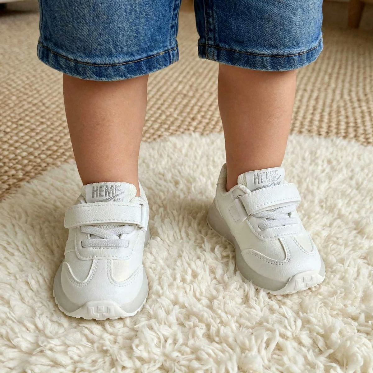 SMILE BABY white LED light-up kids sneakers worn on child