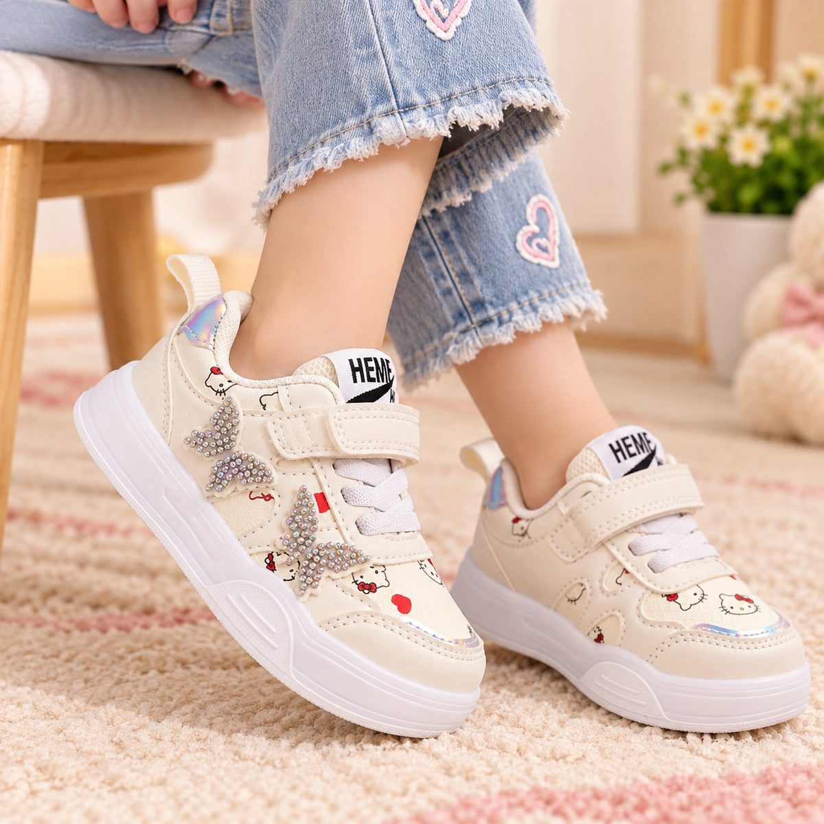 Smile Baby girls white sneakers worn with butterfly detail and comfortable cushioned sole