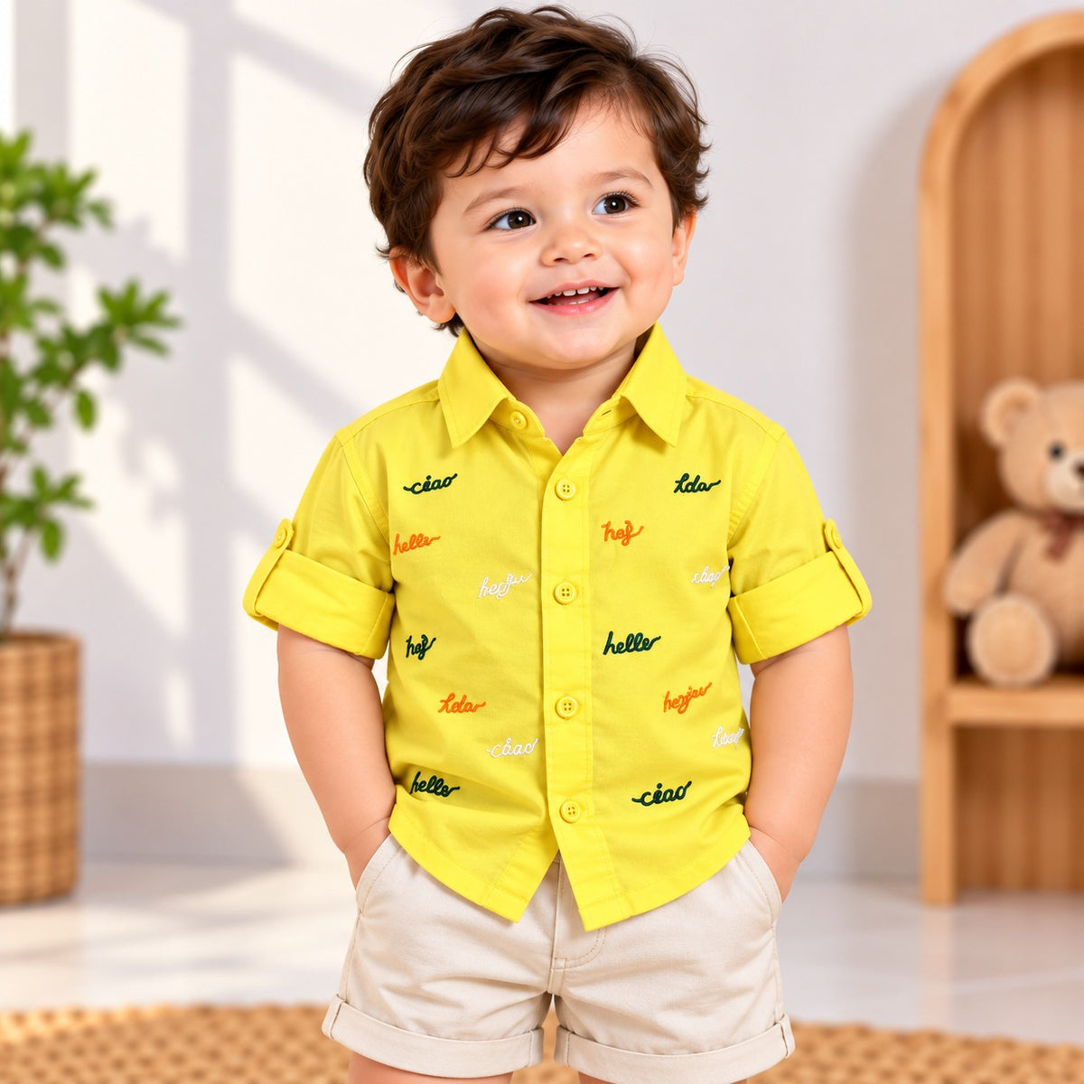 DONOO boys yellow shirt front view with colourful lettering and roll-up sleeves