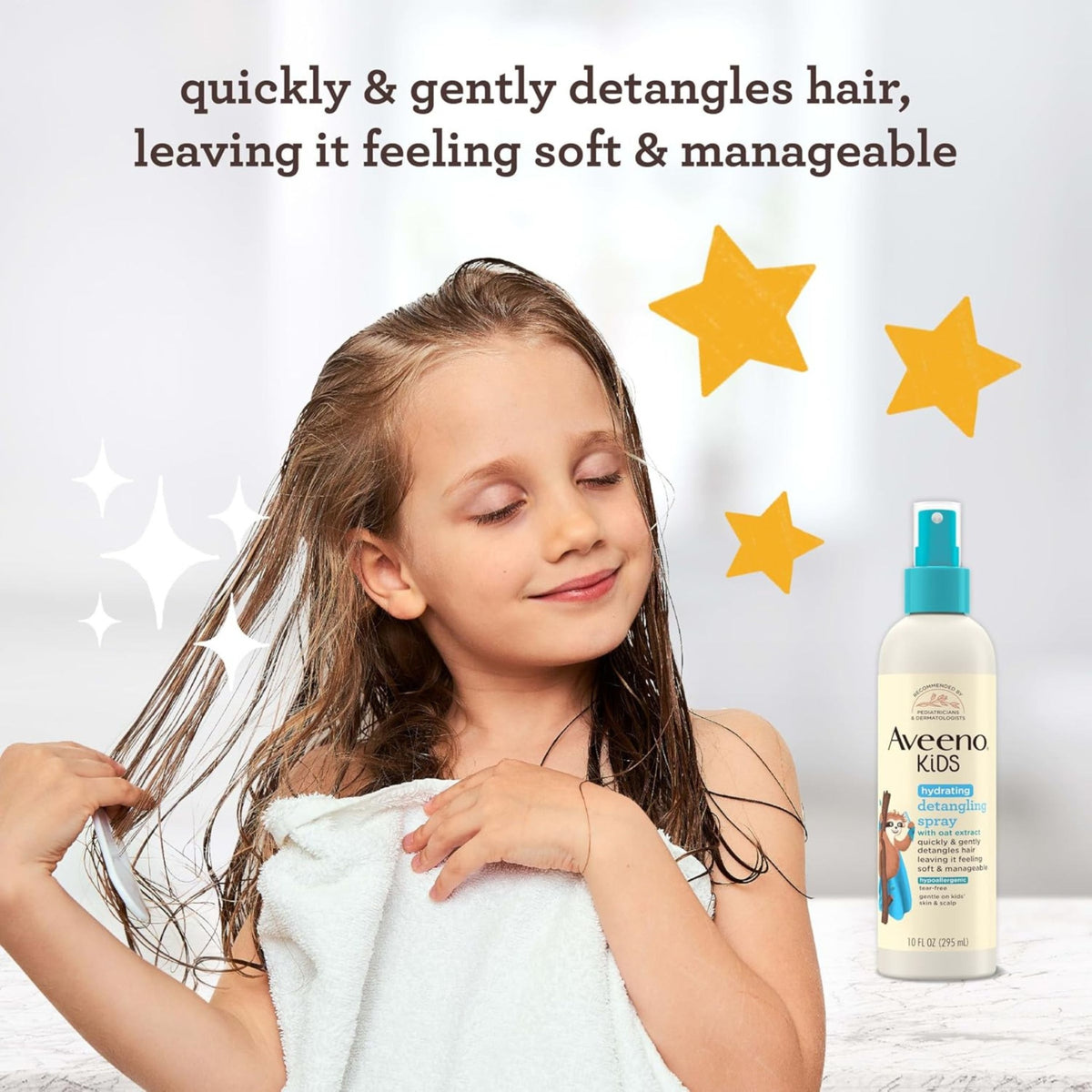 Aveeno Kids detangling spray shown with child brushing hair