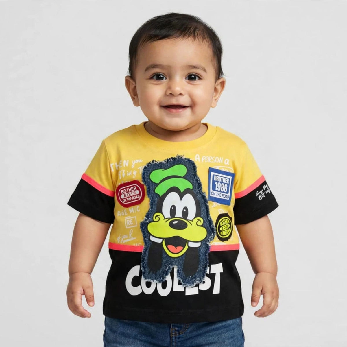 COOLEST toddler boys yellow graphic T-shirt with cartoon patch, black color-block hem and coral sleeve trim