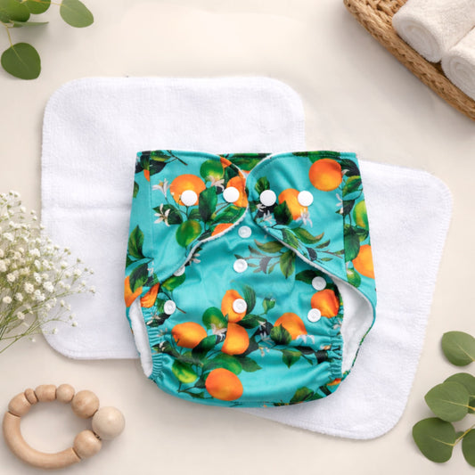 SuperBottoms BASIC Reusable Cloth Diaper with Quick Dry UltraThin pads | 100 % cloth , Freesize, washable Diapers for baby | Adjustable Snap Button Baby Diaper | Soft, Leak-Proof & Eco-Friendly | Orange Print