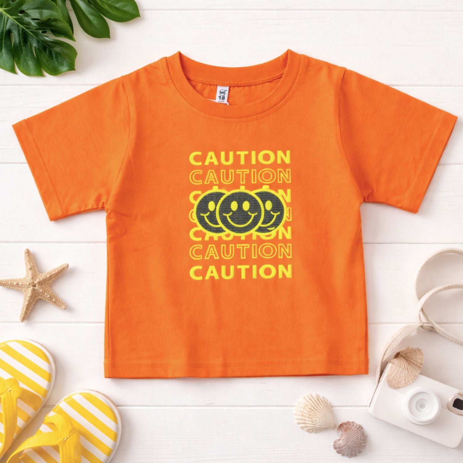 Smile Baby Kids “CAUTION Smiley” Graphic T-Shirt – Cream & Orange | 18 Months to 6 Years
