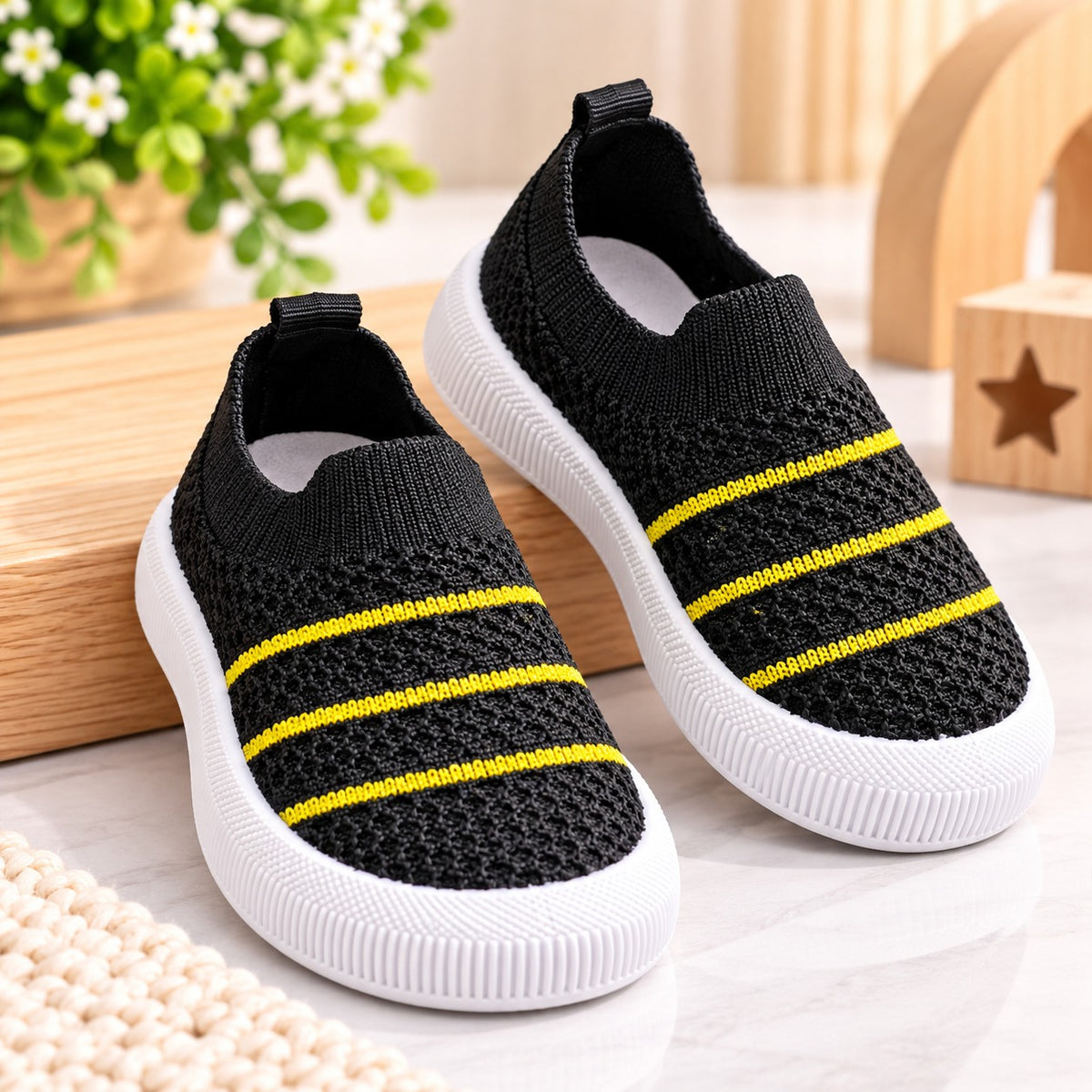Smile Baby boys black knit sneakers with yellow stripes