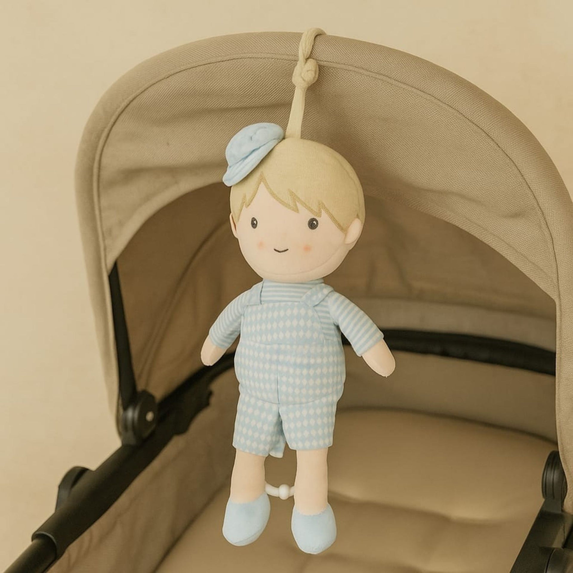 Smile Baby Musical Hanging Toy for Stroller & Crib | Soft Plush Boy Doll in Blue | Engaging Rattle Sound | Perfect for Newborns & Infants